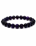 A beaded stretch bracelet made of polished dark purple and black round beads, displayed on a clean white background.